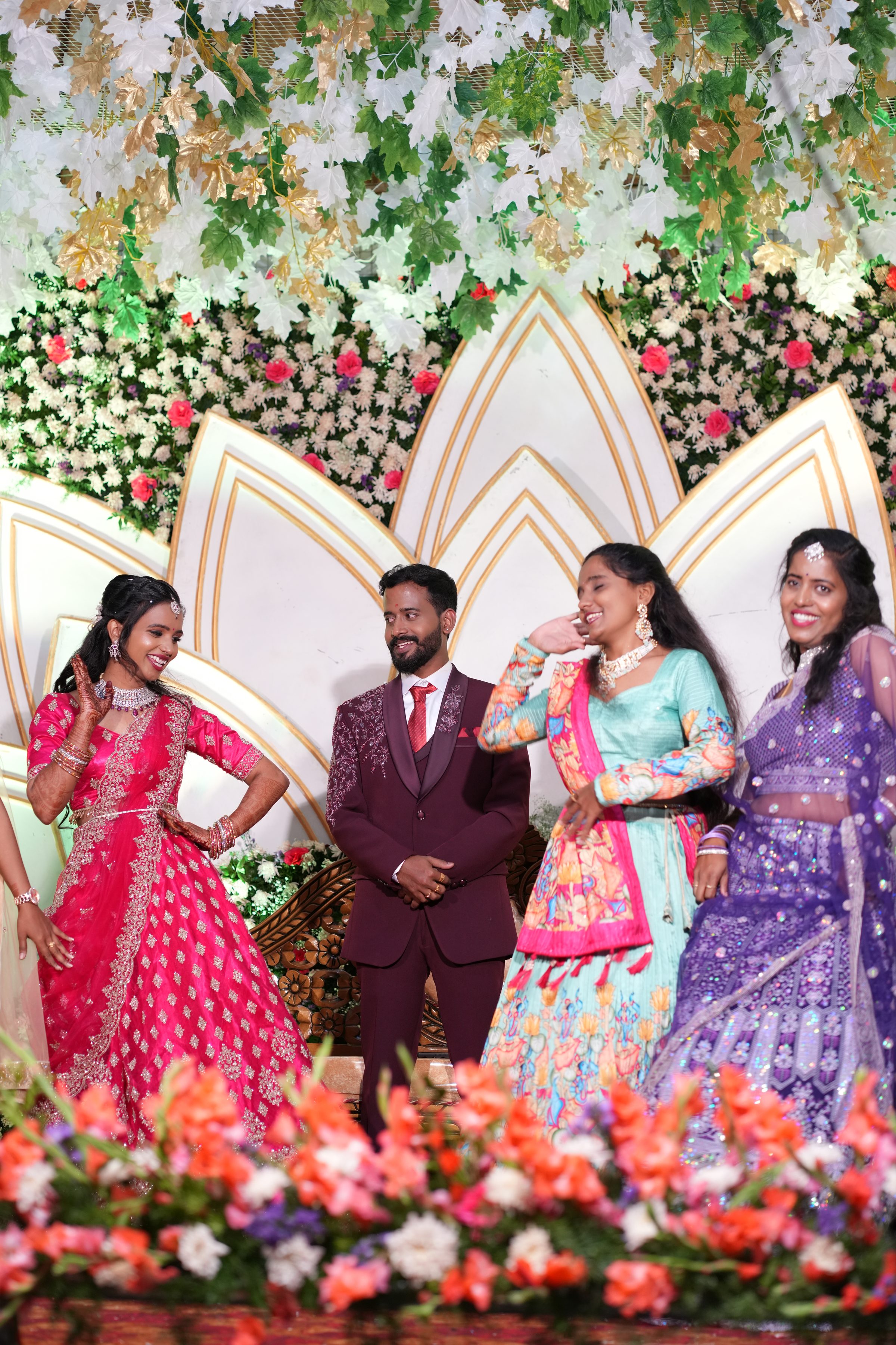 Couple with their wedding photographer during a Bangalore wedding, captured by Lumeora Studios
